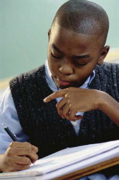 a boy writing