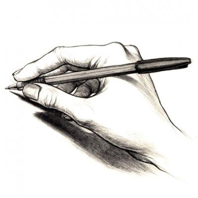 a hand holding a pen